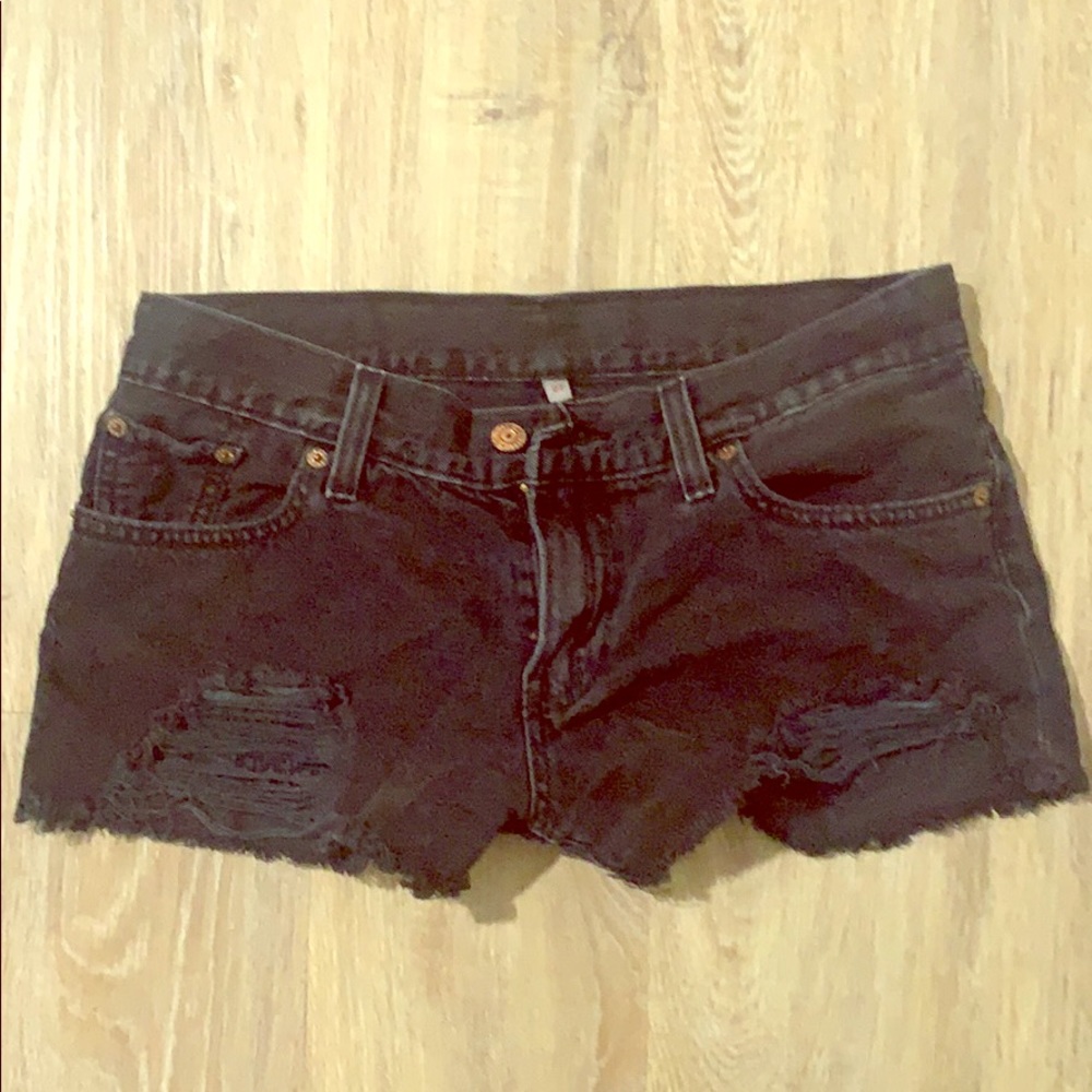 Levi’s 501 black distressed shorts